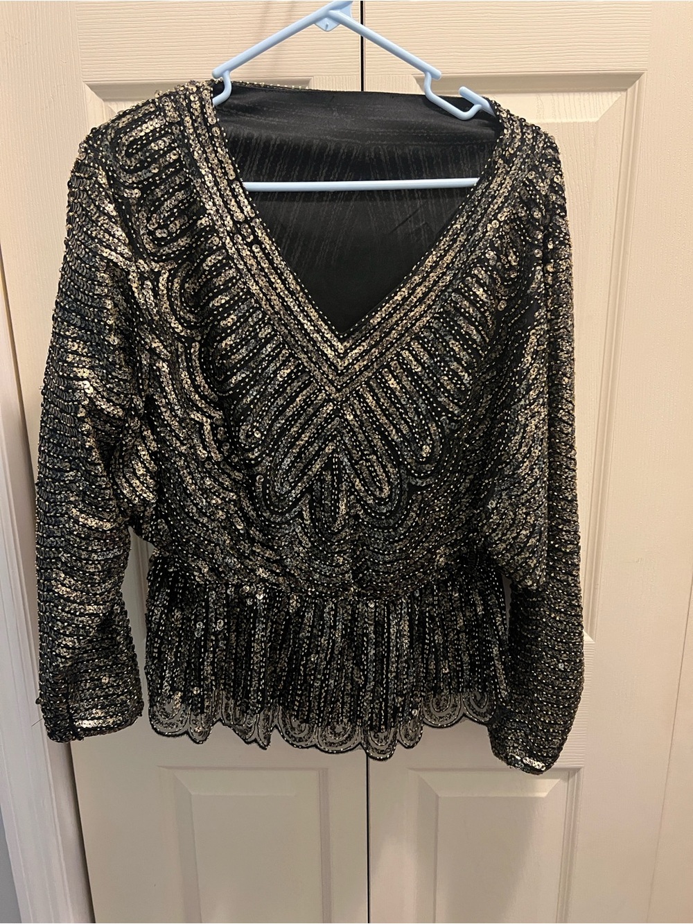 Black and Gold Sequined V-Neck Peplum Top